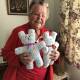 Val Rozysnki from Glen Innes, has knitted hundreds of 'trauma teddies' and donated them to the newly opened Glen Innes ambulance station . Picture supplied.