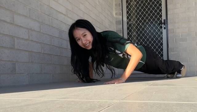 Macintyre High School student Angela Nguyen hopes to complete 3249 push-ups in 24 days to raise funds for mental health awareness. 