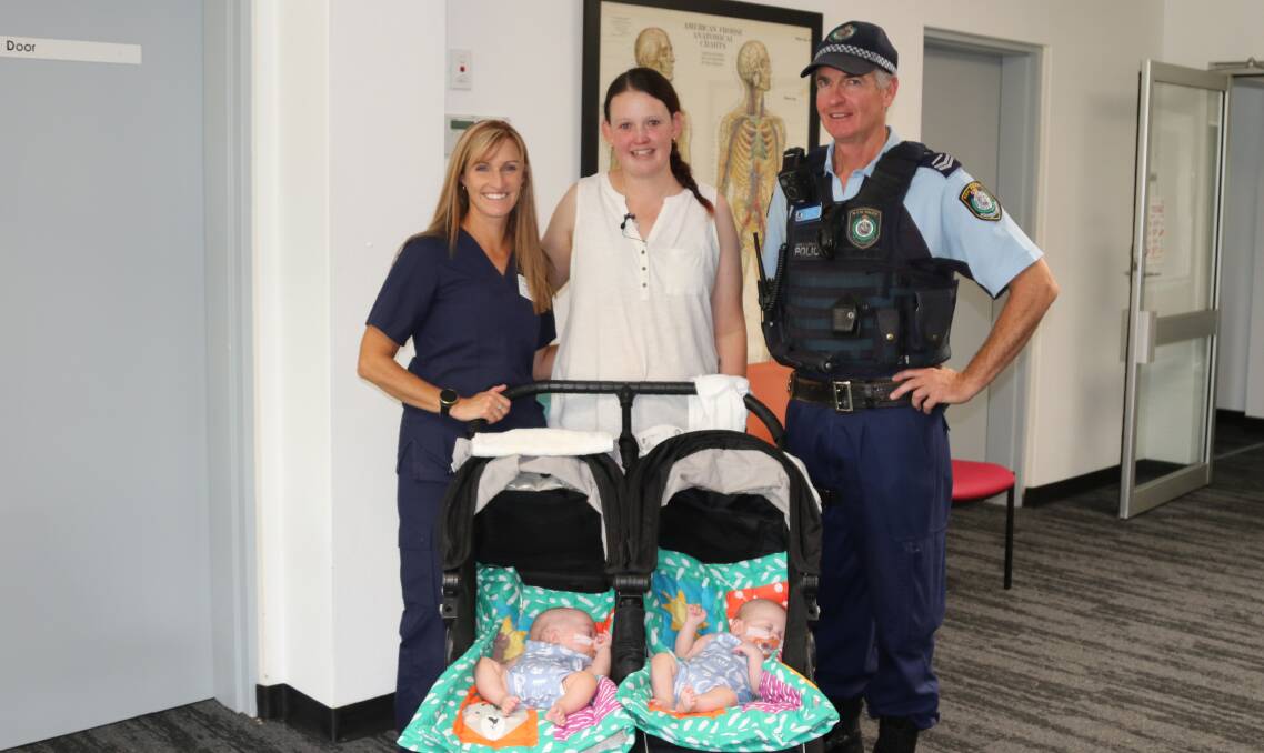 Health Services Manager and Registered Midwife/Nurse Kath Randall and Senior Constable Darrel Monckton reunited with Emma Wilkins and her twin boys Declan and Dominic. 