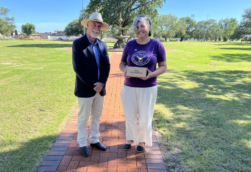 Inverell Shire Mayor Paul Harmon with 2024 Citizen of the Year Zoe Hannam. Picture supplied. 