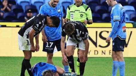 Luke Brattan of Sydney FC goes down injured during the A-League Men Elimination Final match. (Mark Evans/AAP PHOTOS)